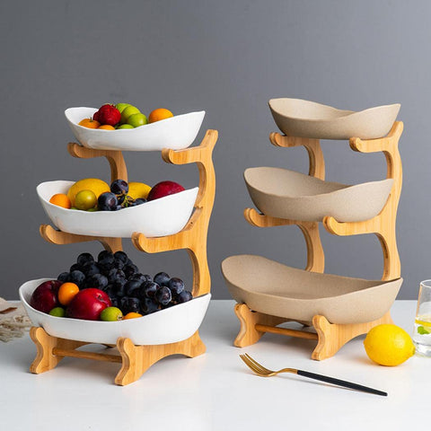 Jessie porcelain bowls on bamboo stand for stable counter storage.