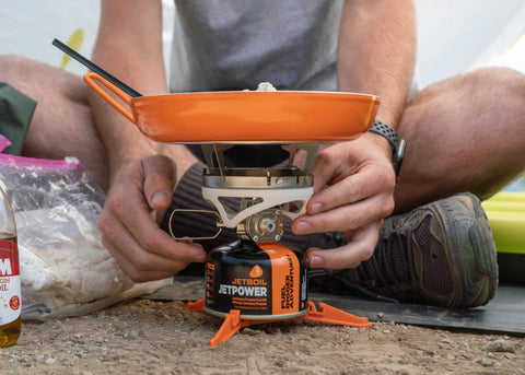 Jetboil Summit skillet with nesting turner stored in the handle.