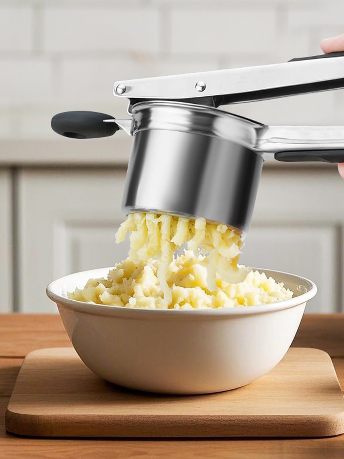 Jetonn ricer doubles as a versatile press for vegetables.