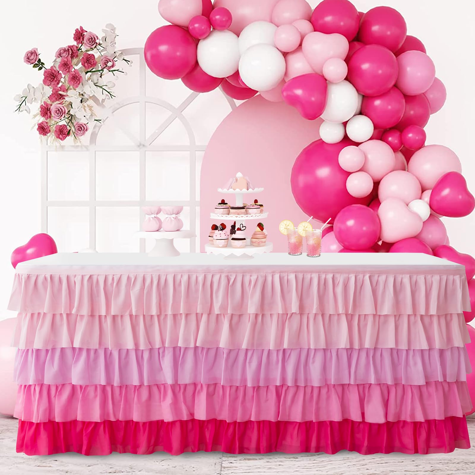 Jevix pink tutu table skirt at a baby shower decor setup