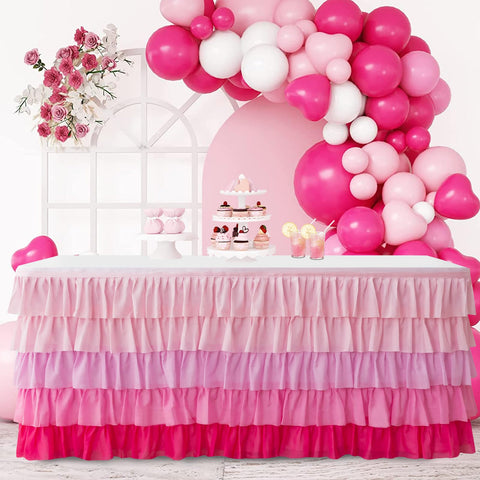 Jevix pink tutu table skirt at a baby shower decor setup