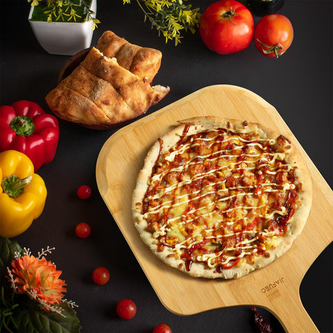 JIAFUEO wooden pizza paddle designed with a hanging hole for space-saving storage.