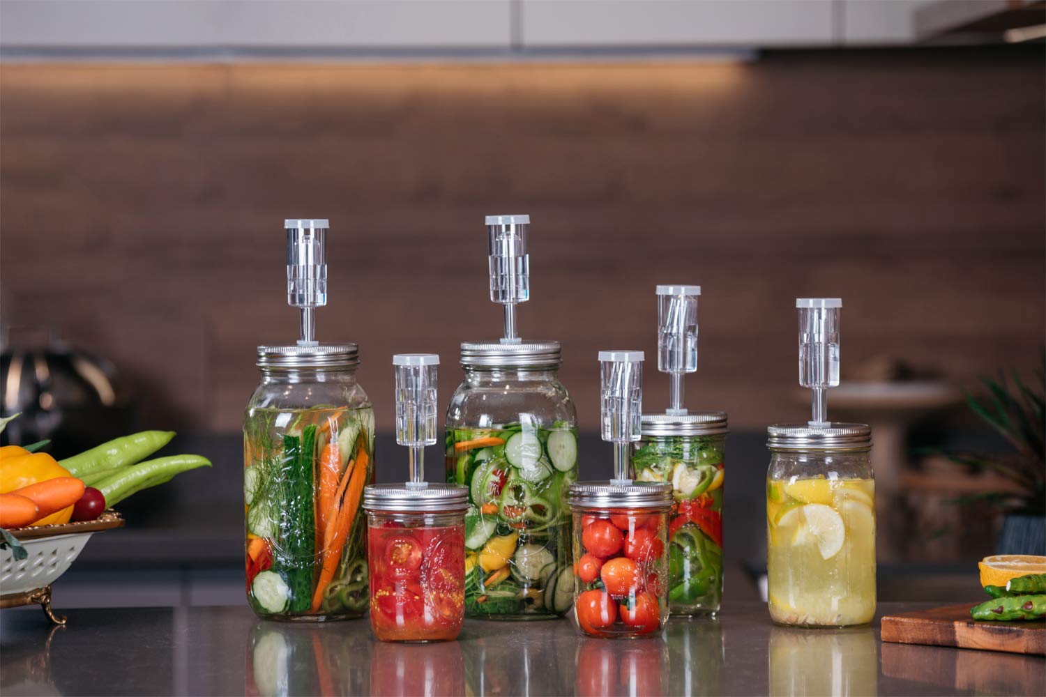 Jillmo fermentation kit package with four lids and accessories.
