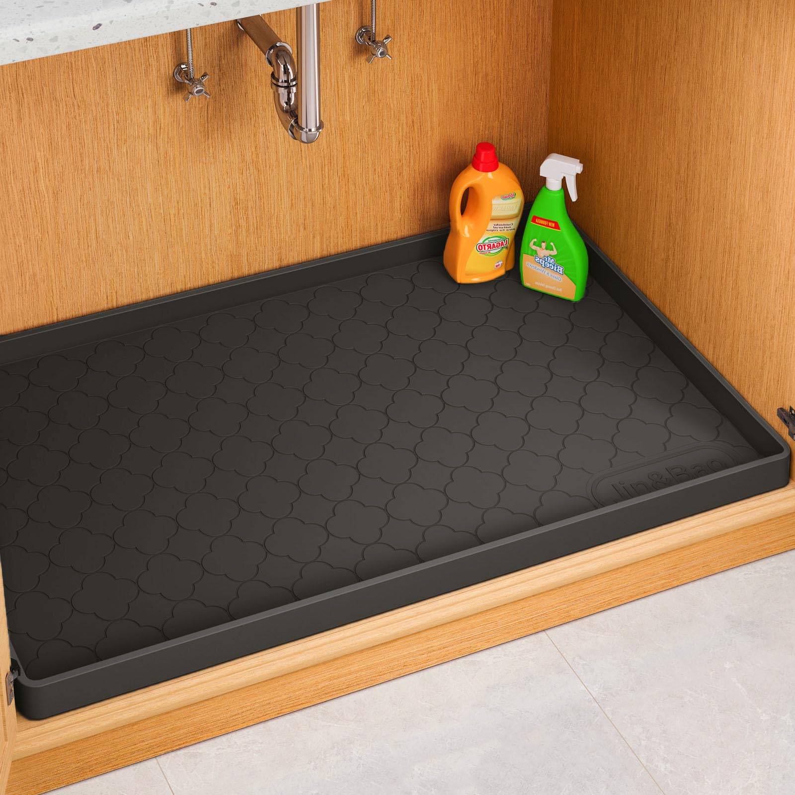 Jin&Bao under-sink mat 34x22 with raised edge protects cabinets from spills.