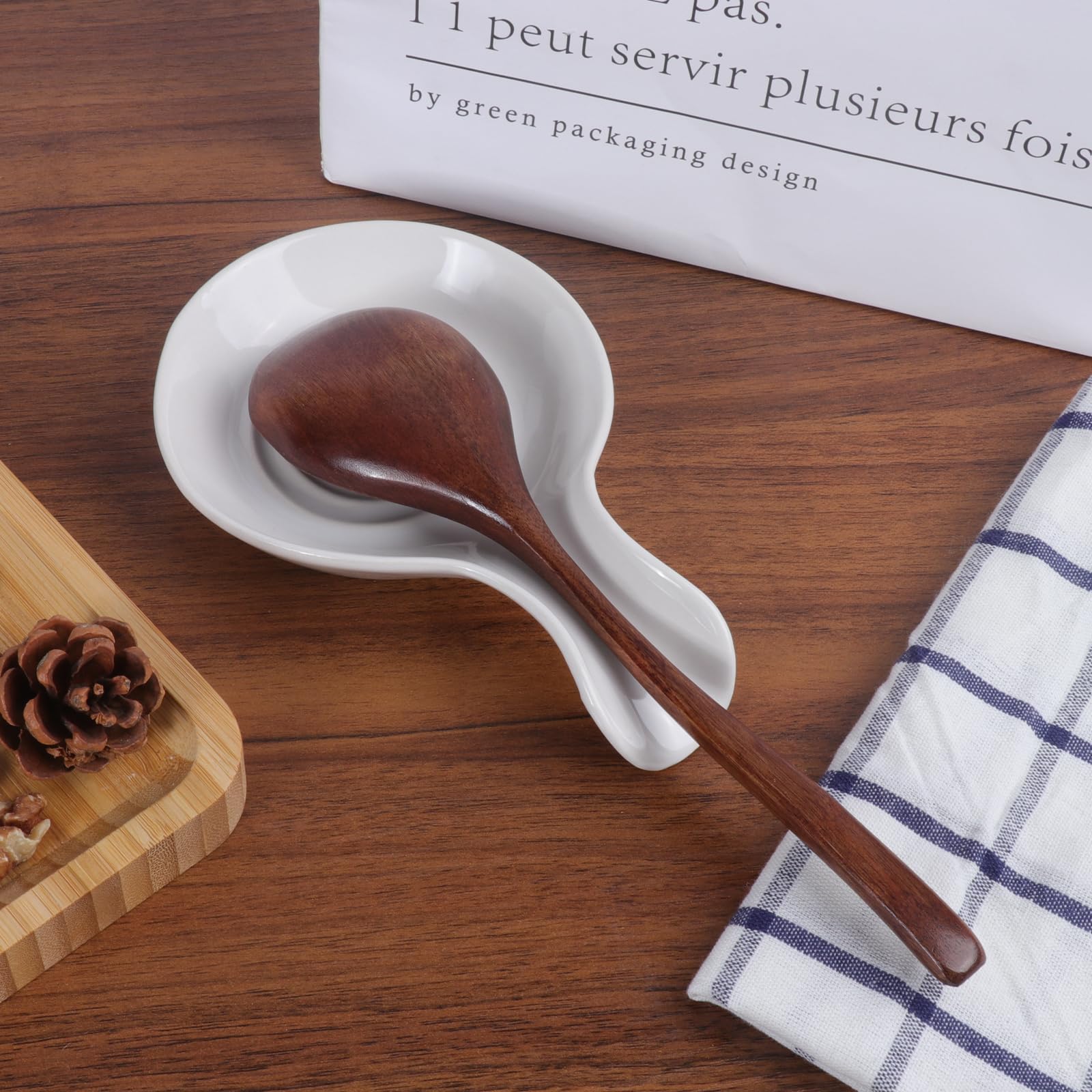 Fits spoons, spatulas, and tongs for clutter-free countertops.