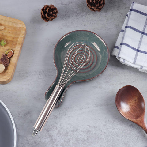 JINIHFW heat-resistant ceramic spoon rest protects countertops during use.
