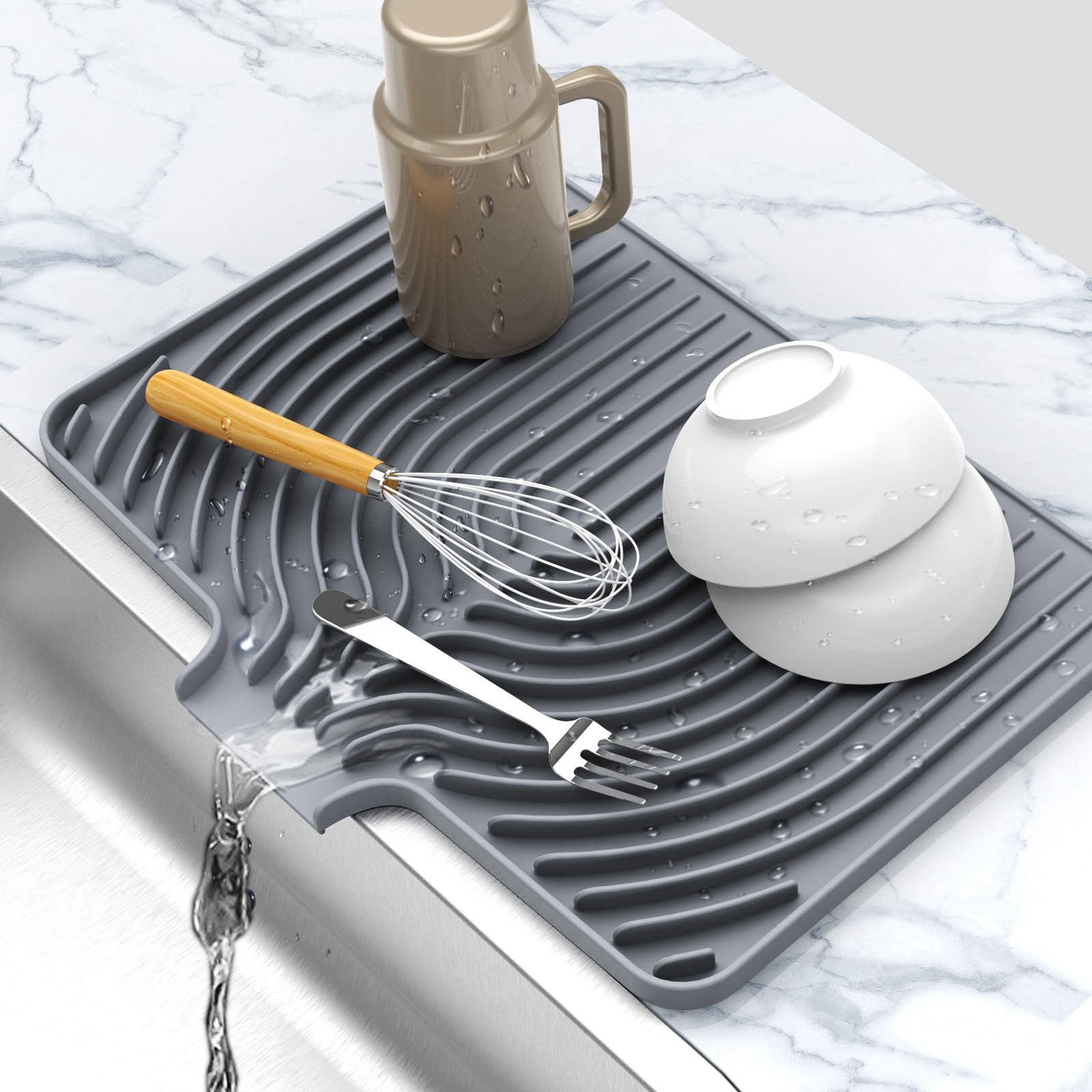 JIUBAR dish drying mat by the sink with drain spout keeps water away from counters.