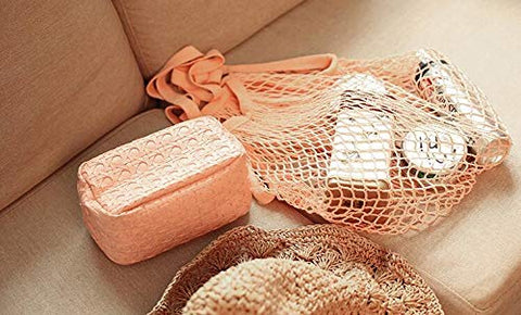 JM-capricorns long-handle mesh bag shown folded for compact storage.