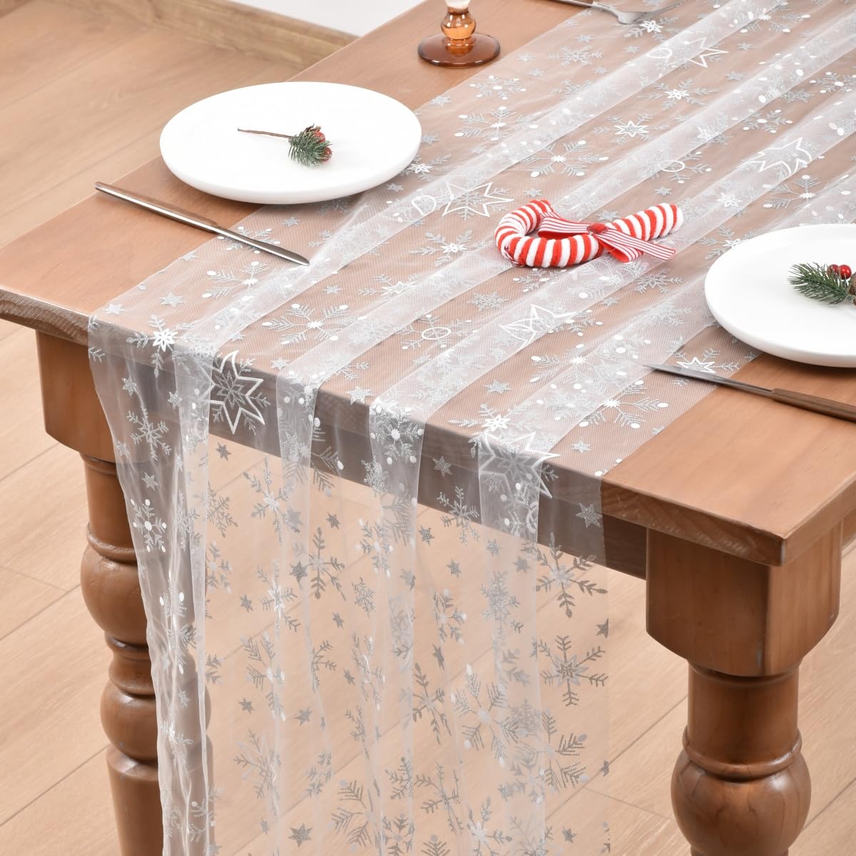Joanlody white snowflake gauze runner adds festive sparkle to holiday tables.