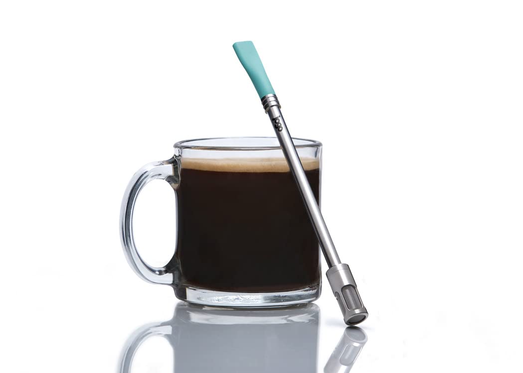 JoGo portable coffee straw in hand, showcasing compact travel-ready design.