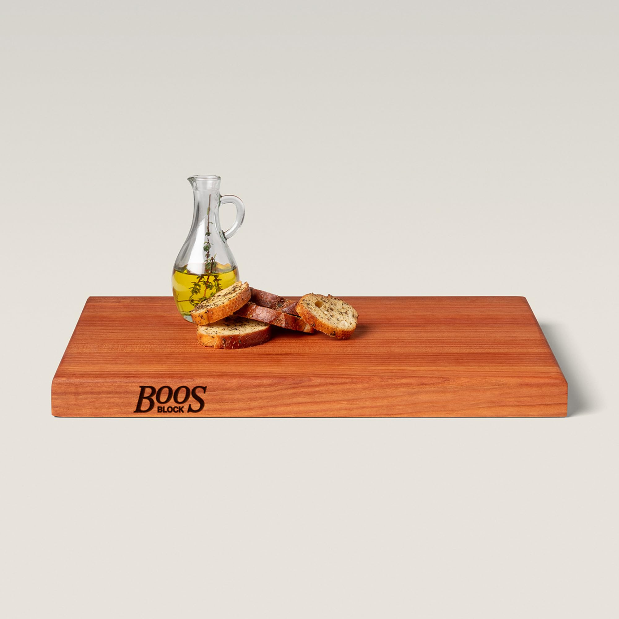 Charcuterie-ready wooden board for serving meats and cheeses.