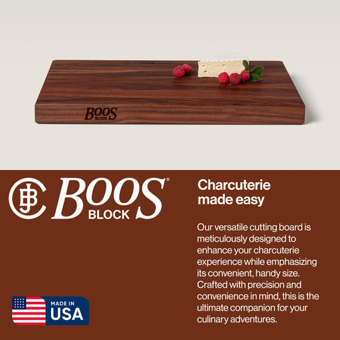 John Boos R-Board walnut with finger grips for secure handling.