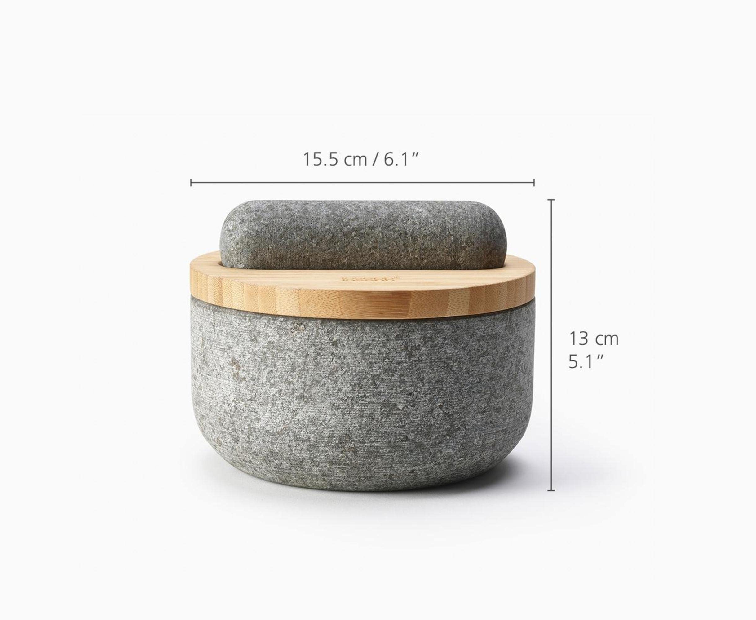 Dash pestle stored on top of lid for tidy counter space