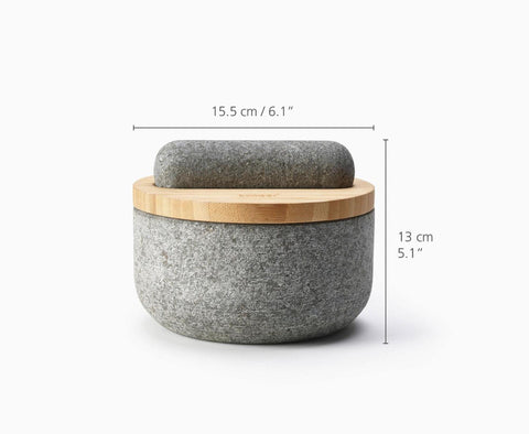 Dash pestle stored on top of lid for tidy counter space