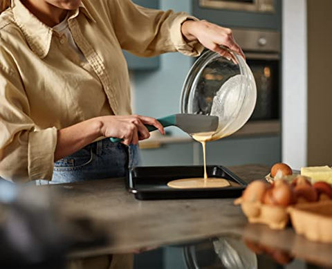 Joseph Joseph Duo silicone spatula bowl-scrape capability for thorough mixing.