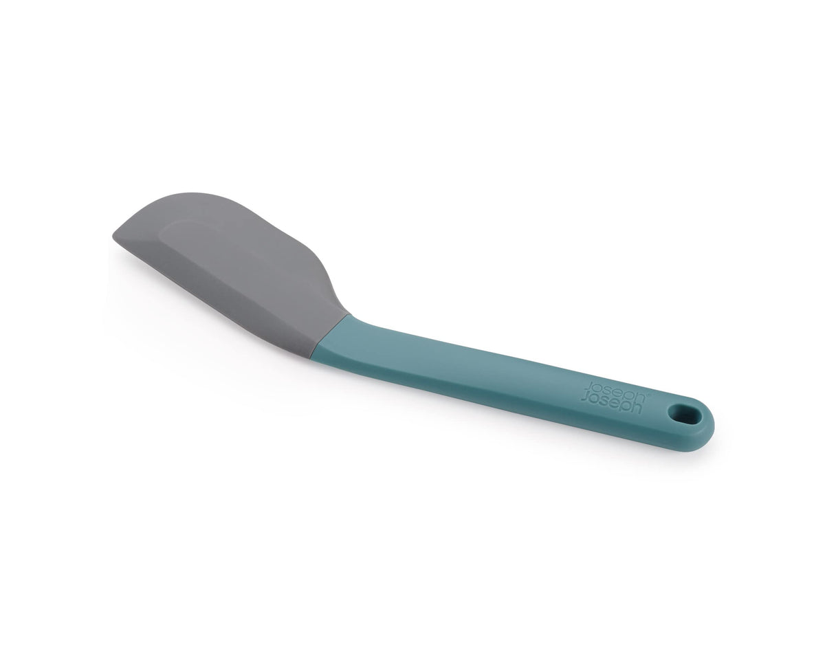 Joseph Joseph Duo silicone spatula ergonomic head for smooth bowl scraping.