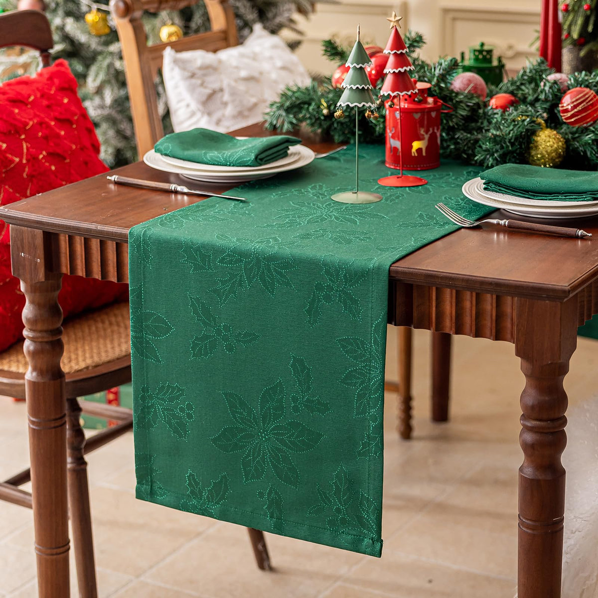 Joyfol Day waterproof jacquard Christmas table runner in green poinsettia close-up for durability.