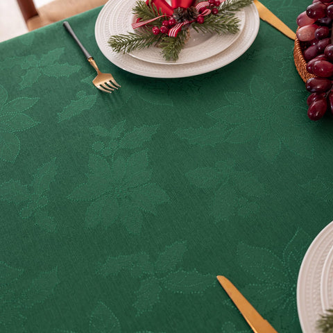 Joyfol Day holiday table setting with poinsettia motif creates a cozy ambiance.