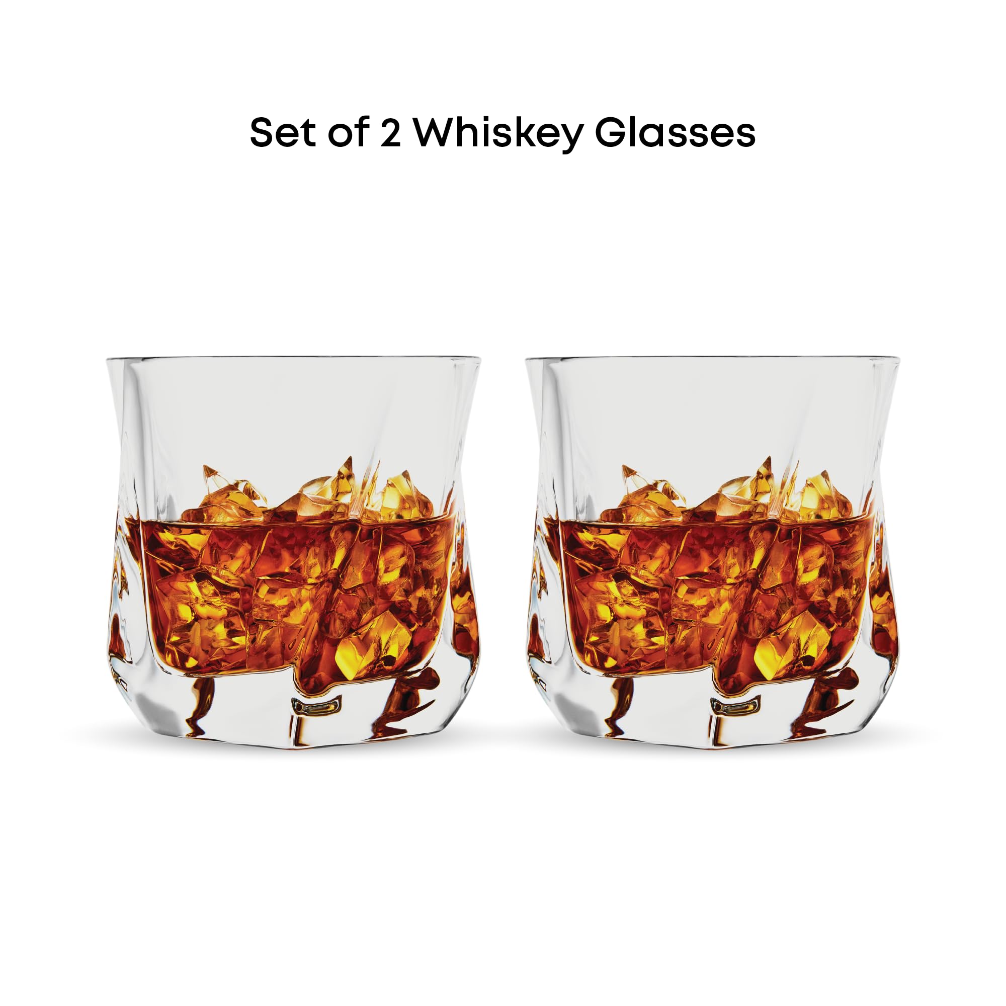 JoyJolt Aurora crystal whiskey glass on rocks for bourbon savoring.