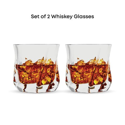 JoyJolt Aurora crystal whiskey glass on rocks for bourbon savoring.