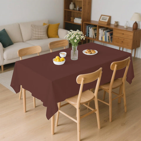 JSQBSECL dining party setup with brown tablecloth creates a cohesive tablescape.