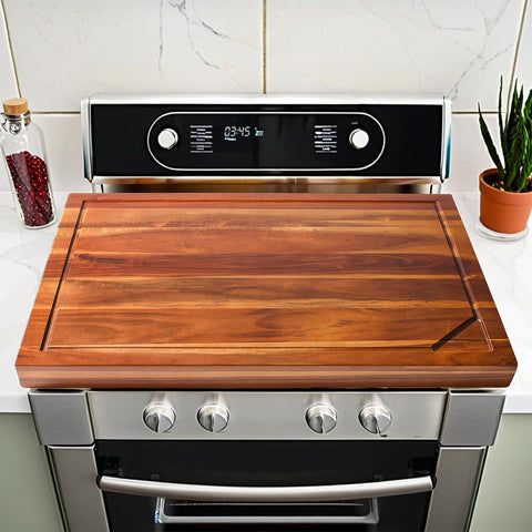 Jubilander stove cover board in acacia wood adds extra prep surface for busy kitchens