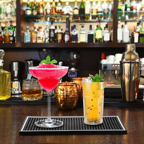 Jucoan bar mat with lip contains drips at the edge