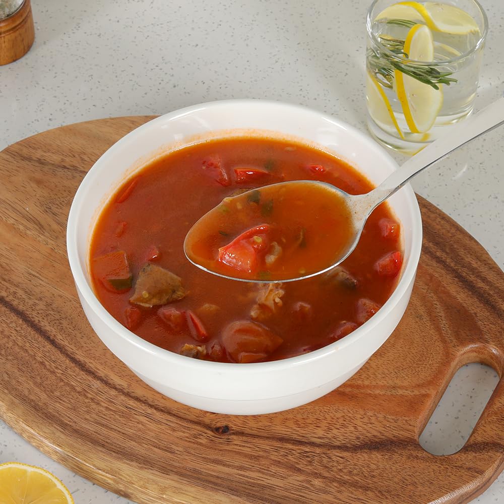 Serving JULIPRO spoons with pasta from a large pot.