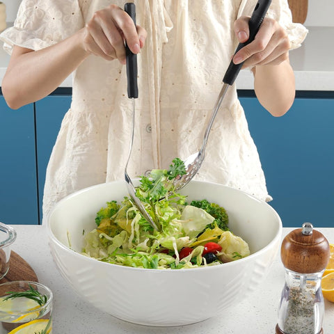 Space-saving design encourages hanging storage in compact kitchens.