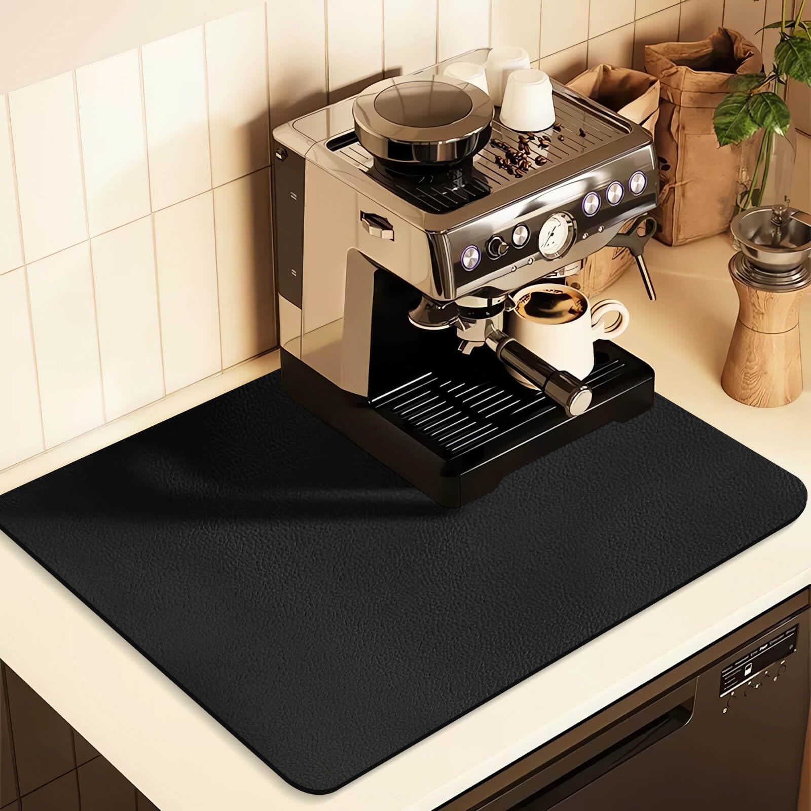 JuSiyley coffee mat under a coffee maker protects counters from spills and stains.