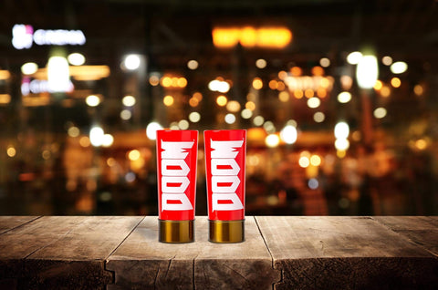 Just Funky DOOM shotgun shell shot glass unboxed for gifting display.