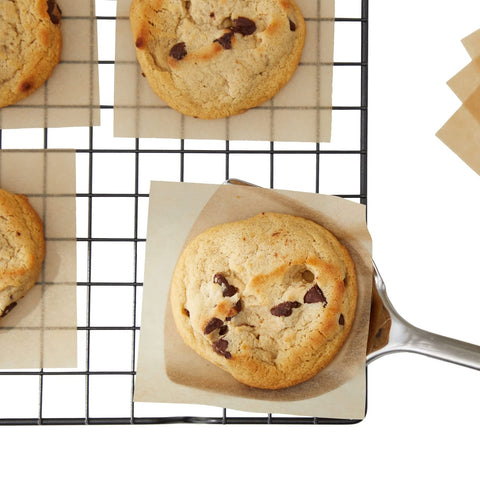 Juvale precut parchment sheets simplify lining cupcake boxes and candy wrappers