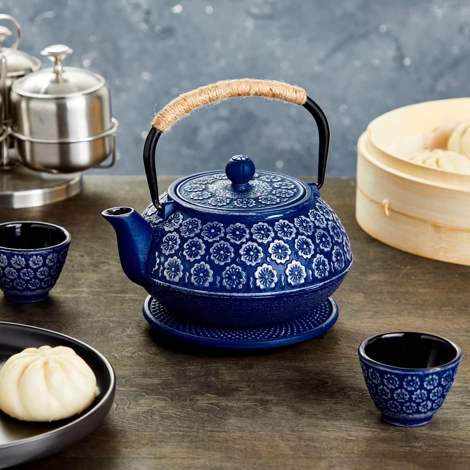 Juvale teapot infuser basket in stainless steel for seamless leaf separation.