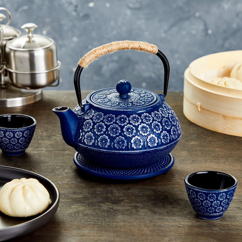 Juvale teapot infuser basket in stainless steel for seamless leaf separation.