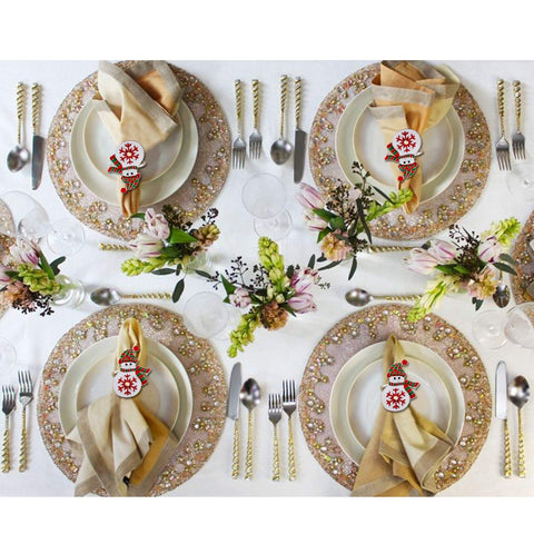 Kalopro napkin buckle highlights Christmas theme on dining tables.