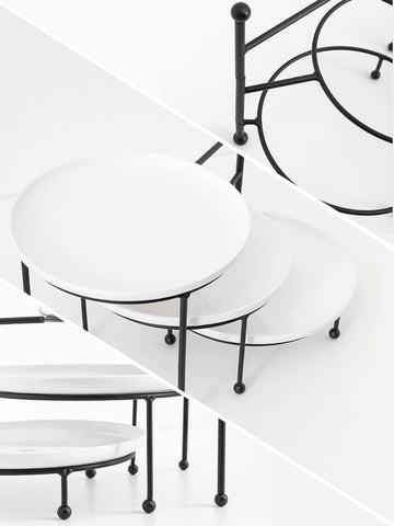 Kanwone black wrought-iron stand providing sturdy support
