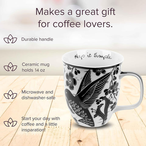 Karma Gifts black and white boho mug close-up showcasing hummingbird illustration.