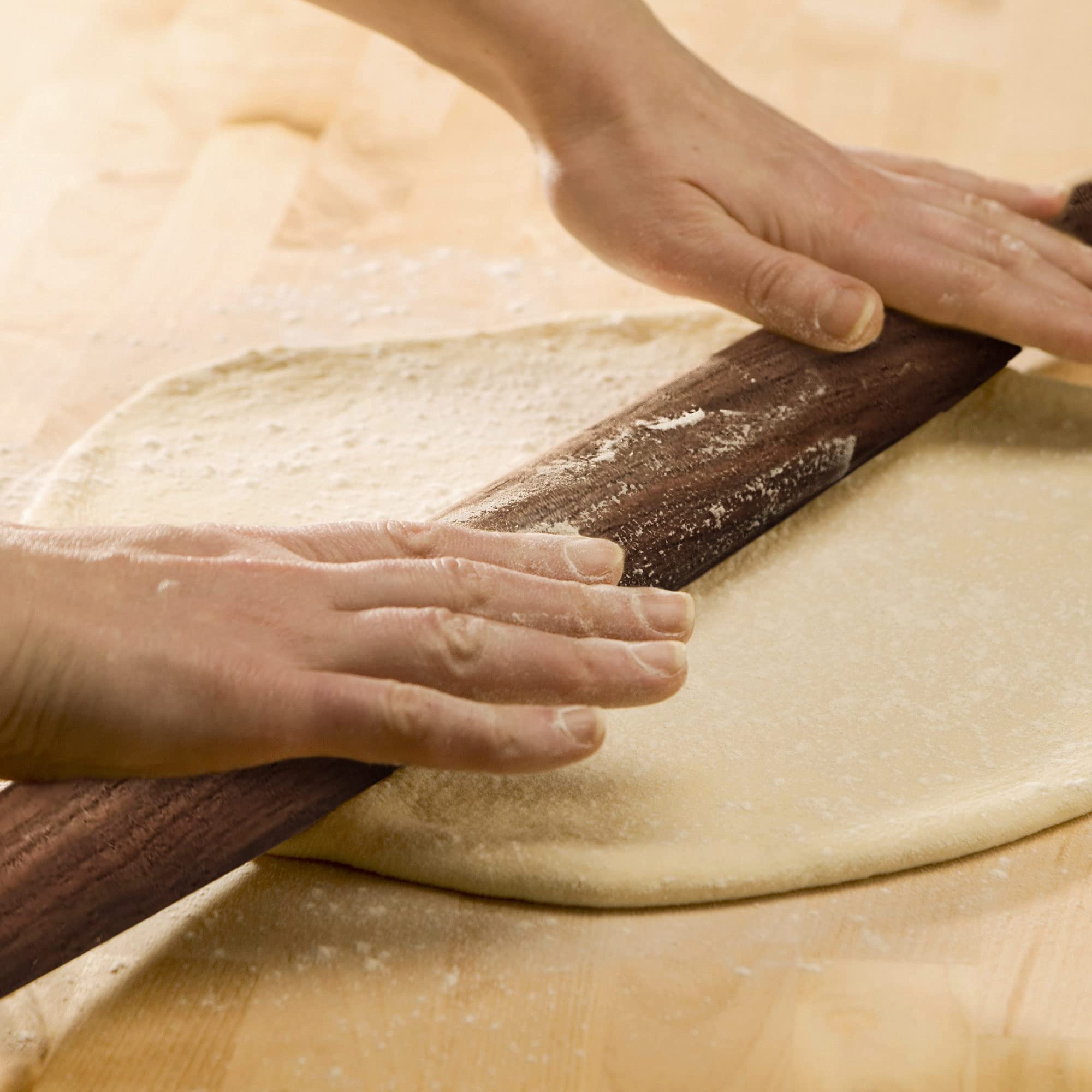 KARRYOUNG rolling pin complements non-stick mats and granite counters.