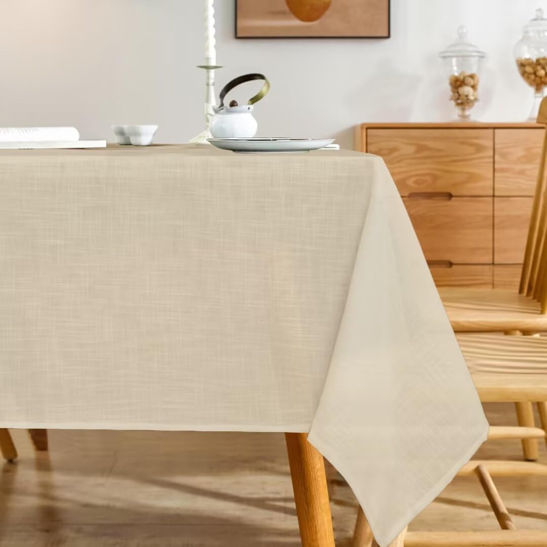 Karseteli natural linen tablecloth in 60x84 inches provides durable, easy-care dining surface.