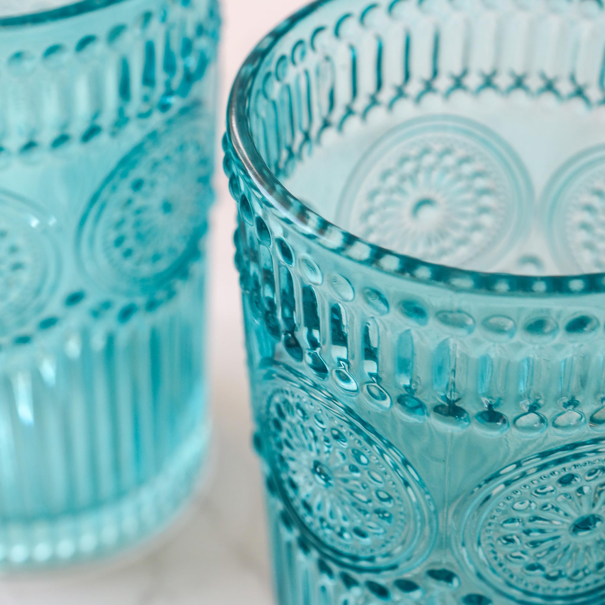 Kate Aspen colored aqua glass adds table vibrancy and color story