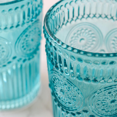 Kate Aspen colored aqua glass adds table vibrancy and color story