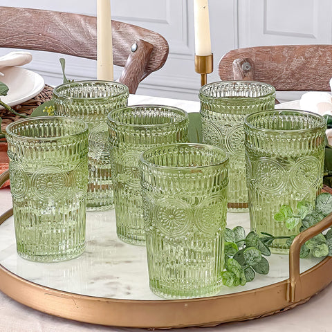 Kate Aspen green glass with embossed floral detail adds vintage charm.