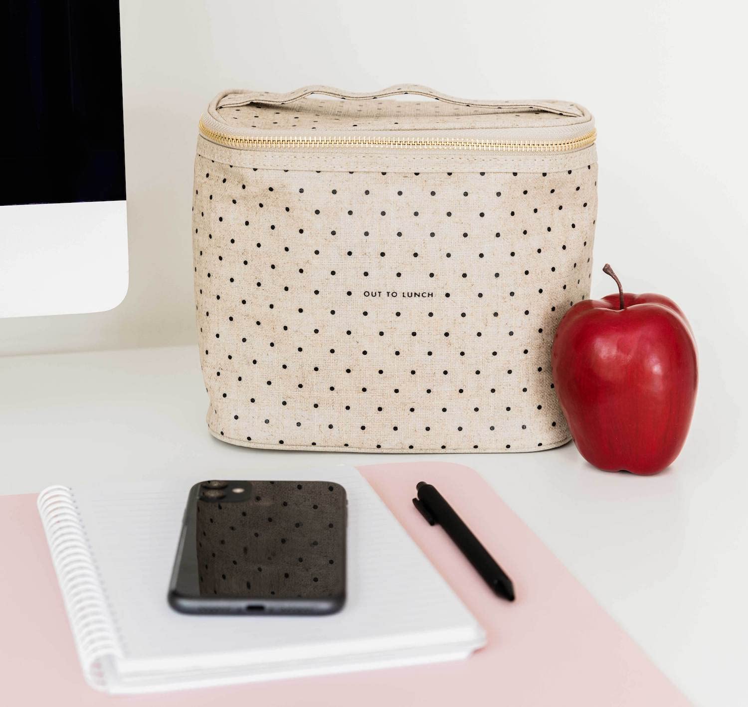Compact eight-by-four-and-a-half-by-seven-point-two-three inches Kate Spade tote.