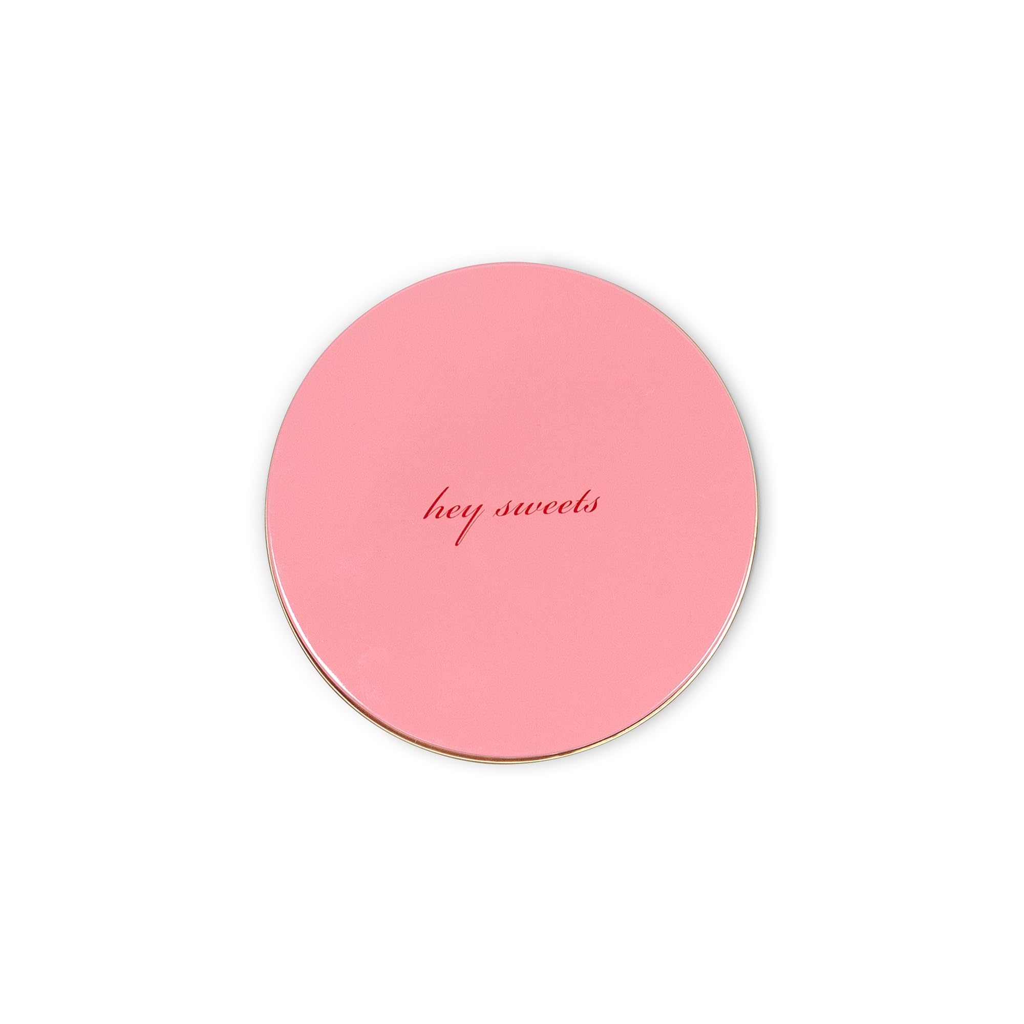 kate spade new york decorative tins stacked for stylish display.