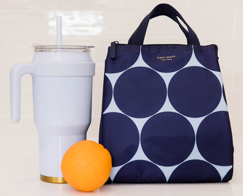 Kate Spade New York Joy Dot lunch bag flat base keeps the tote steady on surfaces.