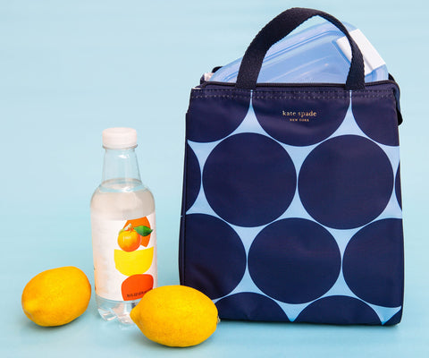 Kate Spade New York Joy Dot lunch bag handles allow easy one-handed transport.