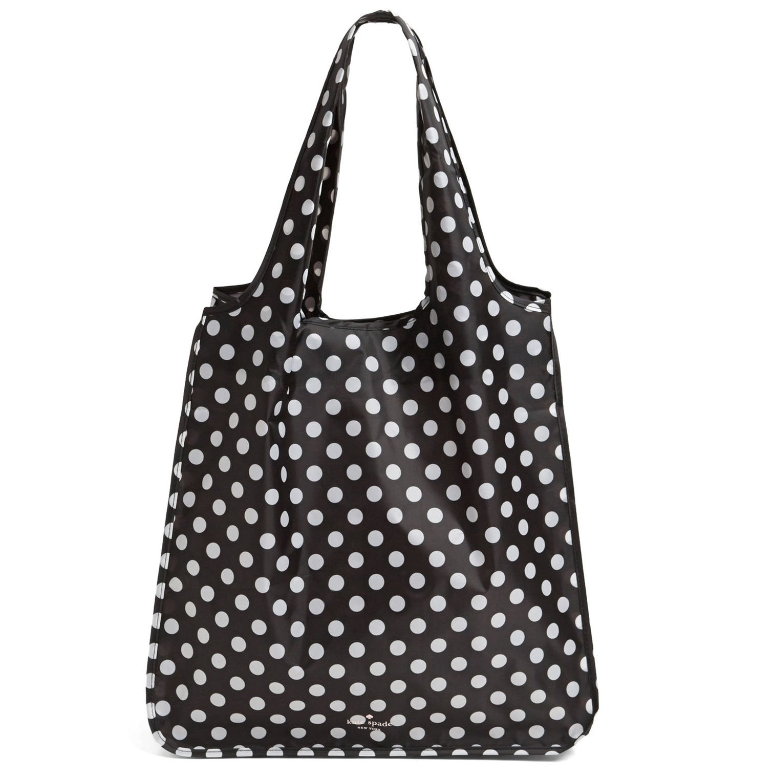 Close-up of Kate Spade New York tote showing tie closure for secure packing.