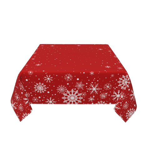 Kawani square tablecloth elegantly draped over a dining table.