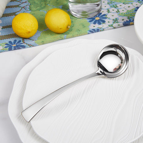 7.6-inch length provides comfortable pouring and portion control.