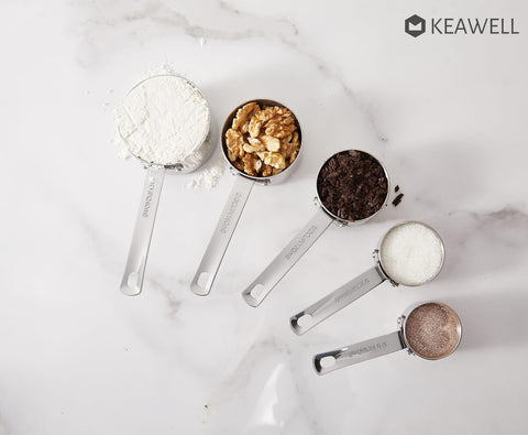 Keawell measuring cups nesting design: space-saving drawer organization.